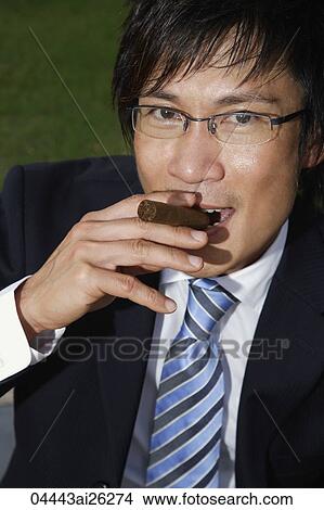 Businessmen with cigar View Large Photo Image Picture - Businessmen with cigar. Fotosearch