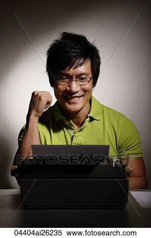 Stock Photography - Man at type writer. Fotosearch