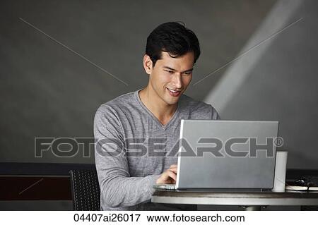 man working on laptop View Large Photo Image Stock Photo - man working on laptop. Fotosearch