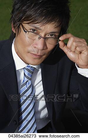 Portrait of businessman with glasses View Large Photo Image Stock Image - Portrait of businessman with glasses. Fotosearch
