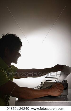 Profile of man at type writer View Large Photo Image Stock Image - Profile of man at type writer. Fotosearch
