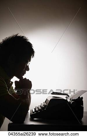 Stock Photo - Profile of man at type writer. Fotosearch