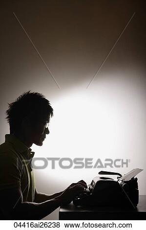 Profile of man at type writer View Large Photo Image Stock Photo - Profile of man at type writer. Fotosearch