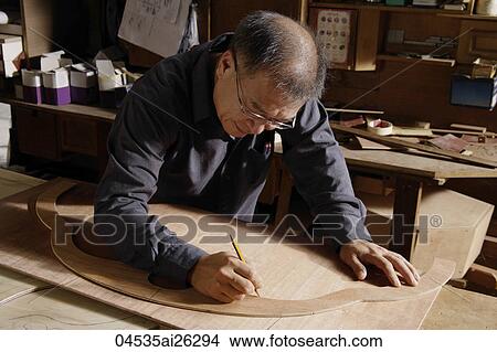 Carpenter working with wood. View Large Photo Image Picture - Carpenter working with wood.. Fotosearch