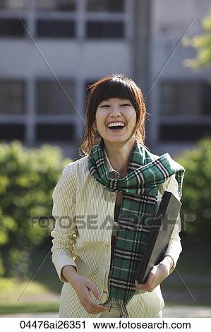 Chinese woman laughing outside. View Large Photo Image Stock Image - Chinese woman laughing outside.. Fotosearch