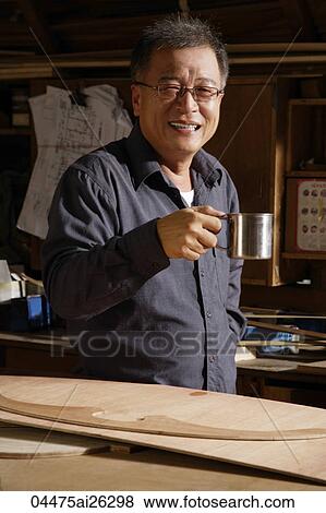 Mature man having a coffee break. View Large Photo Image Stock Photo - Mature man having a coffee break.. Fotosearch