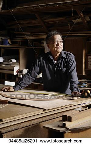 Mature man working with wood. View Large Photo Image Stock Image - Mature man working with wood.. Fotosearch