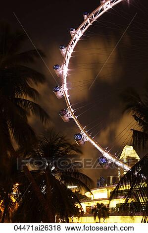 Stock Photo - Night view of Singapore Flyer. Fotosearch