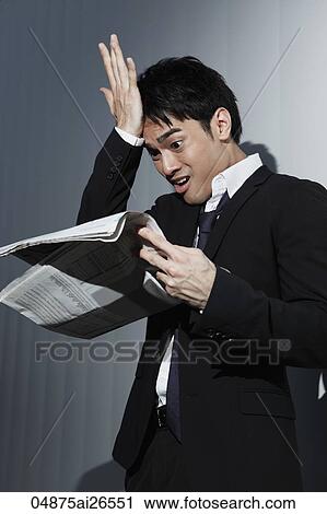 Chinese man holding newspaper hitting his head in surprise View Large Photo Image Stock Image - Chinese man holding newspaper hitting his head in surprise. Fotosearch