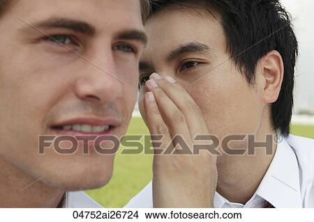 Close up of a man whispering View Large Photo Image Picture - Close up of a man whispering. Fotosearch