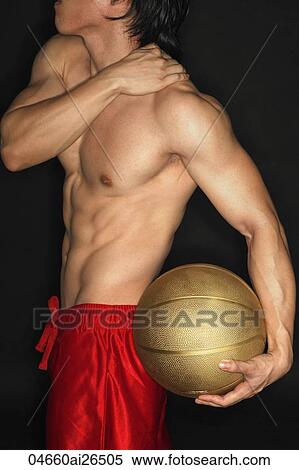 Cropped shot of shirtless man with basketball View Large Photo Image Stock Photography - Cropped shot of shirtless man with basketball. Fotosearch