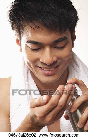 Head shot of Chinese man putting soap in his hands View Large Photo Image Stock Image - Head shot of Chinese man putting soap in his hands. Fotosearch