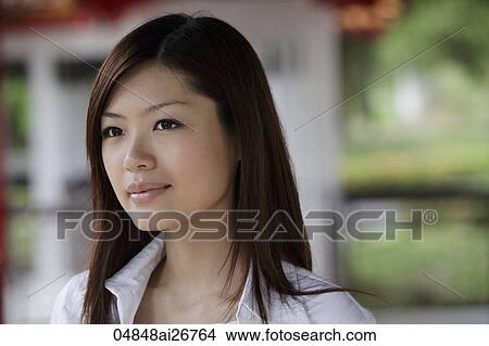 Head shot of Chinese woman outside View Large Photo Image Picture - Head shot of Chinese woman outside. Fotosearch