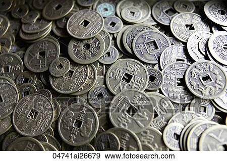 Wide shot of different old Chinese coins View Large Photo Image Stock Photo - Wide shot of different old Chinese coins. Fotosearch