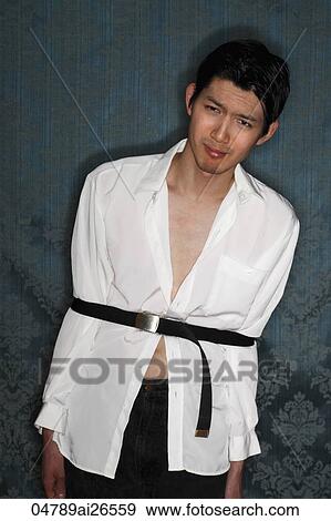 Stock Photo - Young Chinese man tied up with belt. Fotosearch