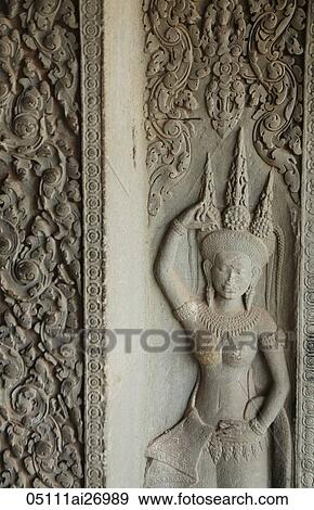 carved image of diety at Angkor Wat, Cambodia View Large Photo Image Stock Photo - carved image of diety at Angkor Wat, Cambodia. Fotosearch