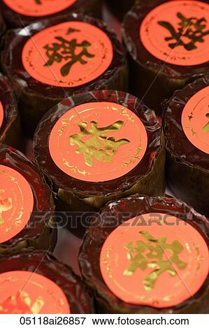 Chinese New Year cake with gold stamp "lucky" View Large Photo Image Stock Photo - Chinese New Year cake with gold stamp "lucky". Fotosearch