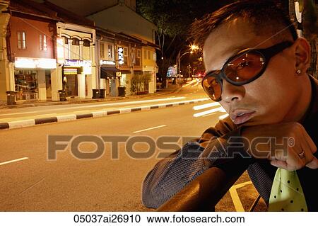 cropped shot of man in front of road at night View Large Photo Image Stock Image - cropped shot of man in front of road at night. Fotosearch