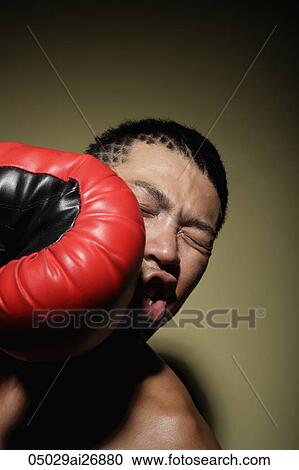 head shot of young man being punched in the face View Large Photo Image Stock Image - head shot of young man being punched in the face. Fotosearch