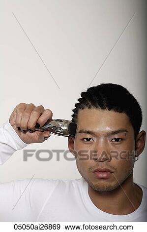head shot of young man with shaved pattern on his head View Large Photo Image Stock Photo - head shot of young man with shaved pattern on his head. Fotosearch
