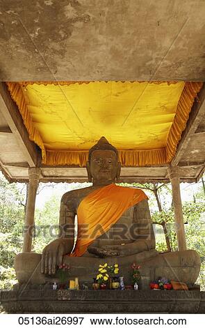 stone carving of Buddha wearing orange sash, Angkor Wat View Large Photo Image Stock Photo - stone carving of Buddha wearing orange sash, Angkor Wat. Fotosearch