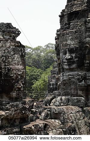stone carving of Buddha's face, Angkor Wat Cambodia View Large Photo Image Picture - stone carving of Buddha's face, Angkor Wat Cambodia. Fotosearch