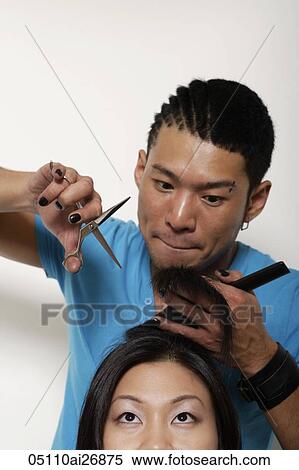 young man cutting woman's hair View Large Photo Image Stock Photography - young man cutting woman's hair. Fotosearch