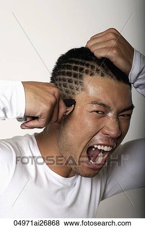 young man with shaved pattern on his head View Large Photo Image Stock Photo - young man with shaved pattern on his head. Fotosearch