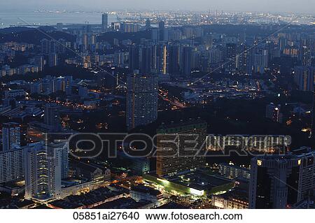Stock Image - Ariel shot of Singapore down town at night. Fotosearch