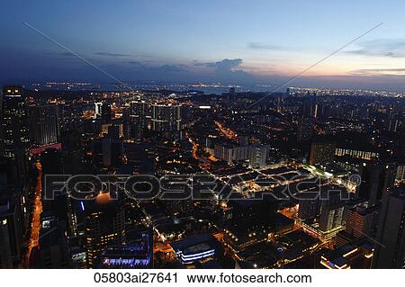 Stock Image - Ariel view of Singapore down town at night. Fotosearch