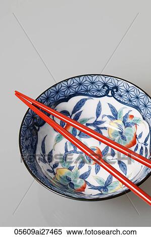 China bowl with red chopsticks on top View Large Photo Image Stock Photography - China bowl with red chopsticks on top. Fotosearch