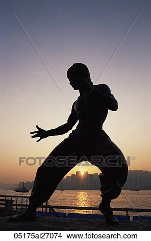 China, Hong Kong, Kowloon, Tsim Sha Tsui, Avenue of the Stars, Bruce Lee Statue View Large Photo Image Picture - China, Hong Kong, Kowloon, Tsim Sha Tsui, Avenue of the Stars, Bruce Lee Statue. Fotosearch