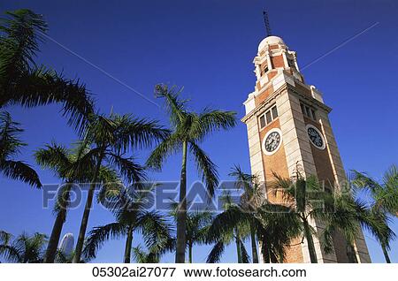 China, Hong Kong, Kowloon, Tsim Sha Tsui, Canton Railway Station Clock Tower View Large Photo Image Stock Photo - China, Hong Kong, Kowloon, Tsim Sha Tsui, Canton Railway Station Clock Tower. Fotosearch