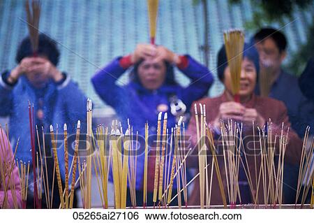 China, Hong Kong, People Preying at Wong Tai Sin Temple View Large Photo Image Stock Photograph - China, Hong Kong, People Preying at Wong Tai Sin Temple. Fotosearch
