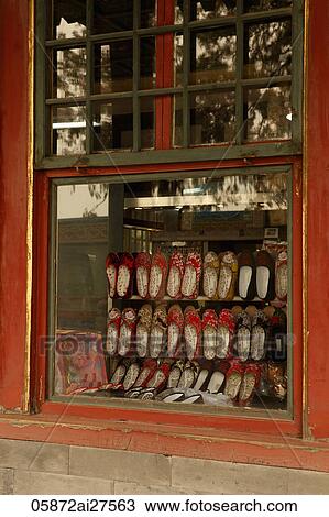 Chinese shoes in window of shop View Large Photo Image Stock Image - Chinese shoes in window of shop. Fotosearch