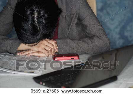 Chinese woman with her head down on table View Large Photo Image Stock Photography - Chinese woman with her head down on table. Fotosearch