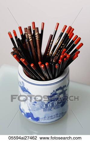 Chopsticks in a China vase View Large Photo Image Stock Image - Chopsticks in a China vase. Fotosearch