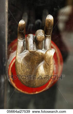 Stock Photo - Close up of bronze hand. Fotosearch