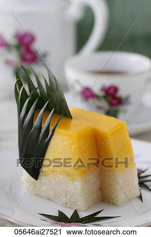 Stock Image - Close up of mango and rice Peranakan dessert. Fotosearch