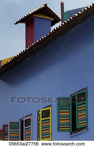 Stock Photograph - Colorful buiding with bright colored windows. Fotosearch
