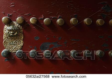 Detail of red door with bronze View Large Photo Image Stock Photo - Detail of red door with bronze. Fotosearch