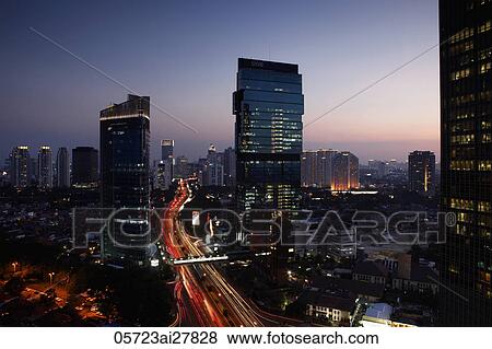 Evening view of CBD and skyscrapers along Jalan Jend Sudirman, Jakarta View Large Photo Image Stock Photo - Evening view of CBD and skyscrapers along Jalan Jend Sudirman, Jakarta. Fotosearch