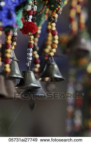 Stock Photo - hanging decoration with bells. Fotosearch