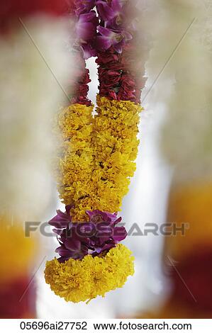 Stock Image - Hanging flower garland. Fotosearch