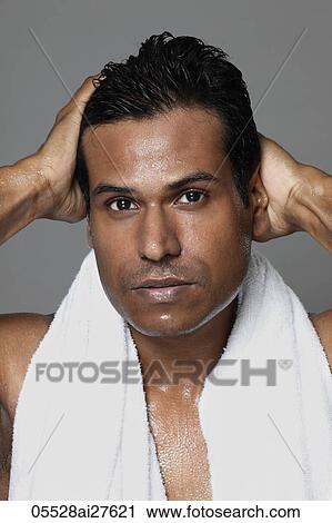 Head shot of man with hands in hair View Large Photo Image Stock Image - Head shot of man with hands in hair. Fotosearch