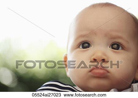 Stock Image - head shot of mixed raced baby. Fotosearch