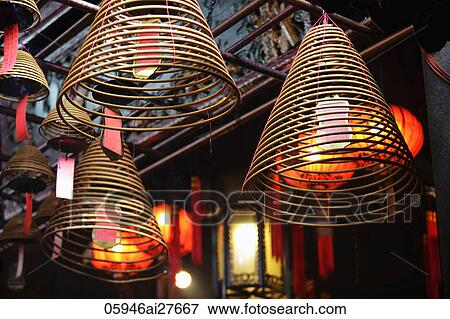 incense coils hanging from Man Mo Temple, Hong Kong View Large Photo Image Stock Photo - incense coils hanging from Man Mo Temple, Hong Kong. Fotosearch