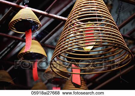 Incense coils hanging from temple ceiling. View Large Photo Image Stock Photo - Incense coils hanging from temple ceiling.. Fotosearch