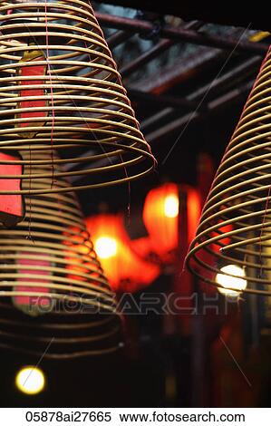 Incense coils with red lanterns in background View Large Photo Image Stock Photography - Incense coils with red lanterns in background. Fotosearch