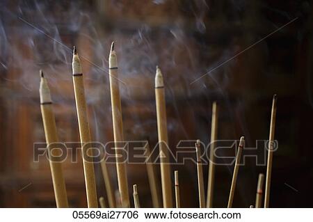 Incense sticks burning. View Large Photo Image Stock Photograph - Incense sticks burning.. Fotosearch
